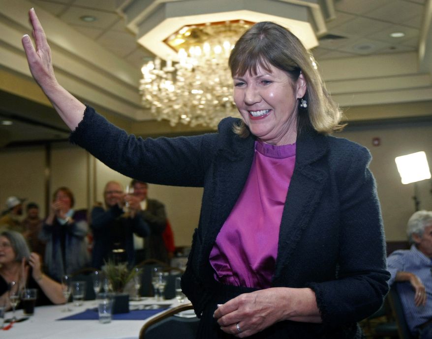 Ann Kirkpatrick waves as she enters a room full of supporters during an election night in Flagstaff, Ariz., in this Nov. 6, 2012, file photo. If 2016 has been the Year of Trump in politics, it may also end up being a new Year of the Woman, if Democrats get their way. (AP Photo/Ralph Freso, File)