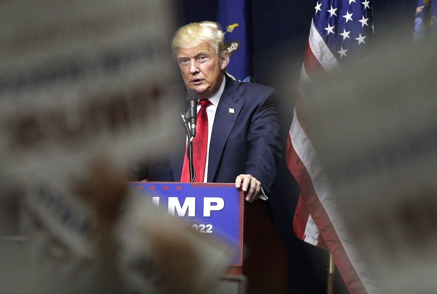 FILE - In this Wednesday, April 6, 2016, file photo, Republican presidential candidate Donald Trump speaks during a campaign rally, in Bethpage, N.Y. Trump says he would create coal-mining jobs as president, and he criticizes Hillary Clinton for saying “we’re going to put a lot of coal miners” out of work. Trump, however, has yet to explain exactly how he will revitalize Appalachia’s coal industry. (AP Photo/Julie Jacobson, File)