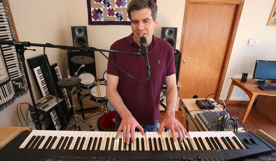 In this Thursday, April 21, 2016 photo, Baylor psychology professor Keith Sanford, who is also a musician plays on his keyboard, in Waco, Texas. Sanford created a song in his home studio called &amp;quot;Variance and Covariance&amp;quot; that he uses for class as a lecture tool. (Jerry Larson  /Waco Tribune-Herald via AP) MANDATORY CREDIT