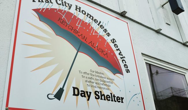 This May 3, 2016 photo shows the sign of the First City Homeless Services in Ketchikan, Alaska.  Cruise ship passengers have been hanging out at an Alaska homeless shelter to get free coffee and a bite to eat, but few have bothered making a donation, said one of the nonprofit&#x27;s board members. (Nick Bowman/Ketchikan Daily News via AP) 