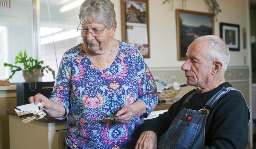ADVANCE FOR WEEKEND EDITIONS MAY 7-8 - In this March 22, 2016 photo, Juan and Beverly Irigoyen in their home in Jackson, Idaho. The memories of a few remaining first-generation immigrants illuminate the classic Basque experience in Idaho. Juan Irigoyen lives in Mini-Cassia's Jackson area with his wife, Beverly. The property is huge, with land they lease to people who grow potatoes, beets and grain. (Stephen Reiss/The Times-News via AP) MANDATORY CREDIT