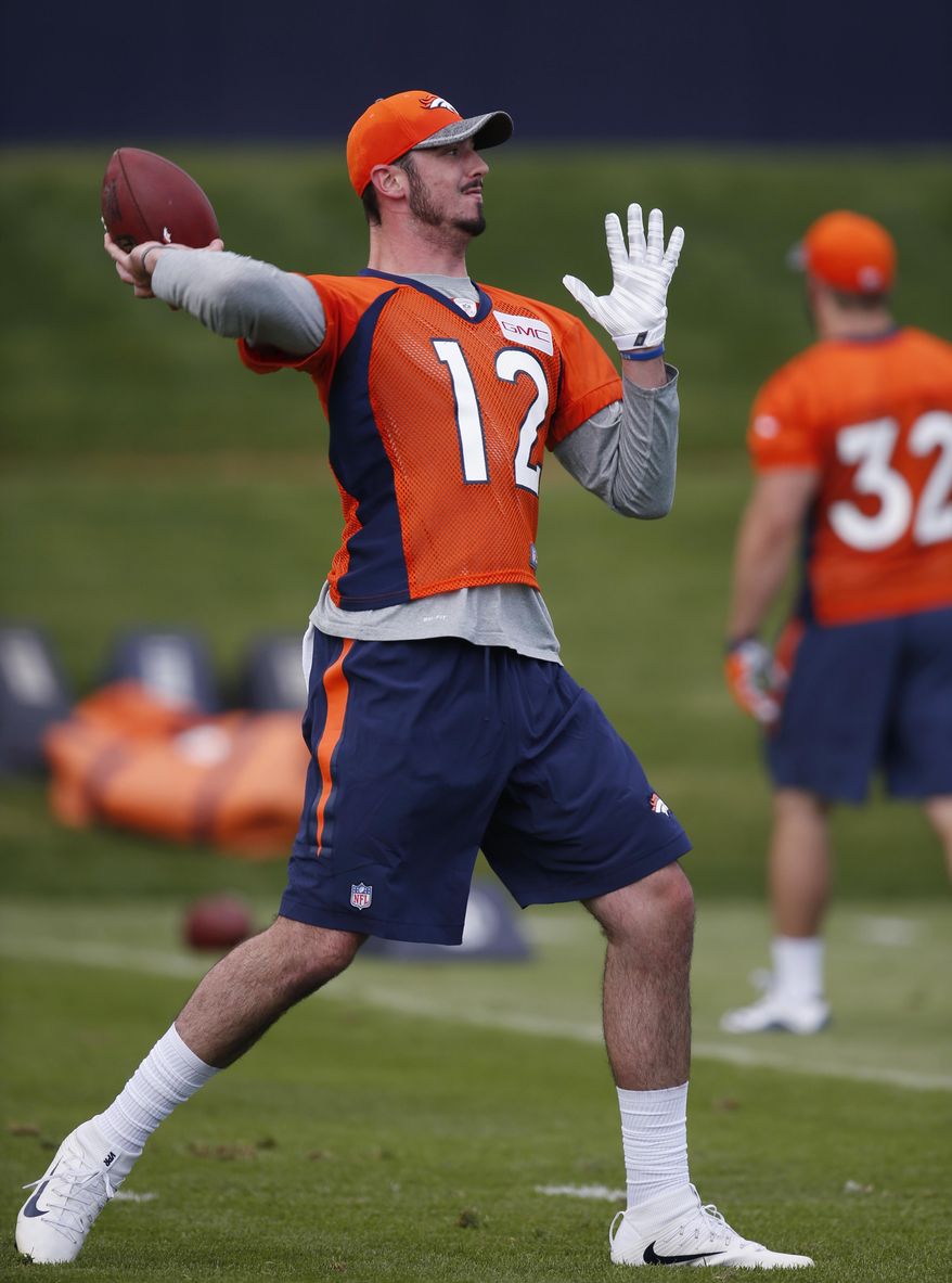 Denver Broncos rookie quarterback Paxton Lynch throws during the team's NFL rookie camp football practice Friday, May 6, 2016, in the team's headquarters in Englewood, Colo. (AP Photo/David Zalubowski)