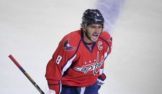Washington Capitals left wing Alex Ovechkin, of Russia, celebrates his goal during the first period of Game 5 in an NHL hockey Stanley Cup Eastern Conference semifinals Pittsburgh Penguins, Saturday, May 7, 2016, in Washington. (AP Photo/Nick Wass)