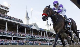 Mario Gutierrez rides Nyquist to victory during the 142nd running of the Kentucky Derby horse race at Churchill Downs Saturday, May 7, 2016, in Louisville, Ky. (AP Photo/David J. Phillip)