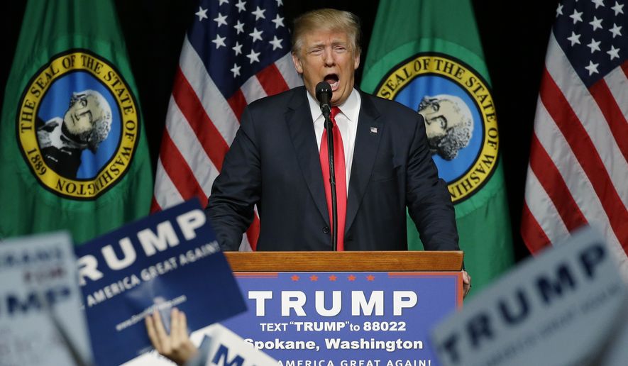 Republican presidential candidate Donald Trump speaks during a rally in Spokane, Washington, on Saturday. Mr. Trump has vehemently opposed many of the trade agreements congressional Republicans have supported, and he put tax increases on the table — something congressional Republicans are sure to oppose. (Associated Press)