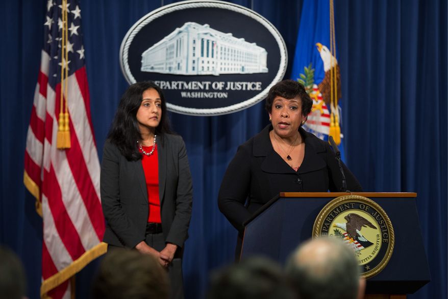 Attorney General Loretta Lynch, with Vanita Gupta, head of the Justice Department&#39;s civil rights division, compared a North Carolina bathroom law to Jim Crow. (Associated Press)