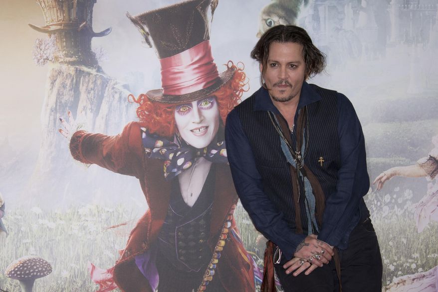 Actor Johnny Depp poses for photographers at the photo call of Alice Through The Looking Glass, at a central London hotel, Sunday, May 8, 2016. (Photo by Joel Ryan/Invision/AP)