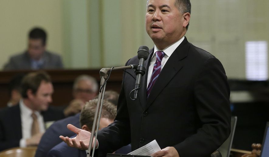 Assemblyman Phil Ting, D-San Francisco, urges lawmakers to approve his gender-neutral restroom measure Monday, May 9, 2016, in Sacramento, Calif. The bill, requiring all single-stall restrooms to be gender-neutral, was approved by the Assembly and sent to the Senate. (AP Photo/Rich Pedroncelli)