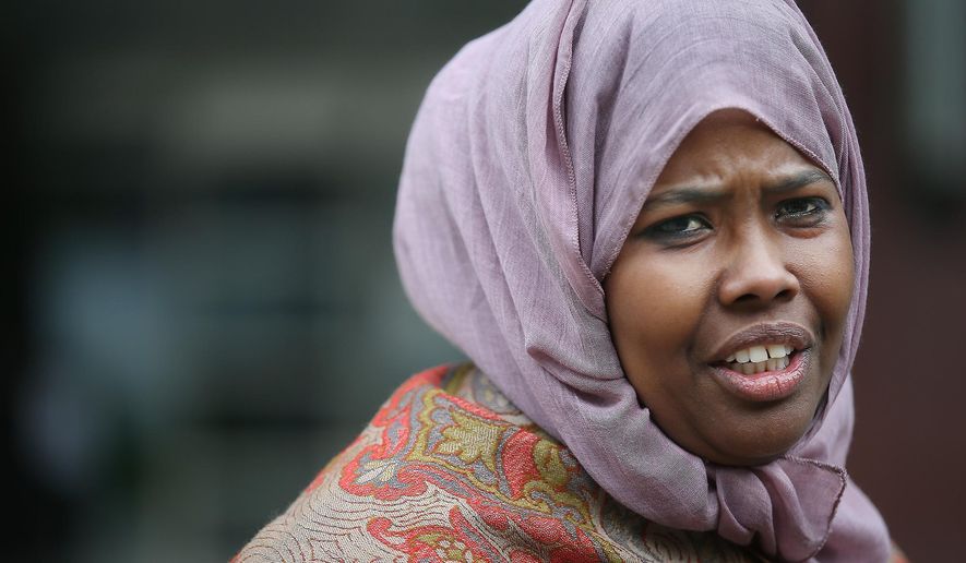 Farah Ayan, the mother of two of the young men standing trial in opening day in the federal trial for three Minnesota men accused of plotting to travel to Syria to join the Islamic State group, speaks to the media in front of the US Courthouse, Monday, May 9, 2016 in Minneapolis, Minn. (Elizabeth Flores/Star Tribune via AP) MANDATORY CREDIT; ST. PAUL PIONEER PRESS OUT; MAGS OUT; TWIN CITIES LOCAL TELEVISION OUT
