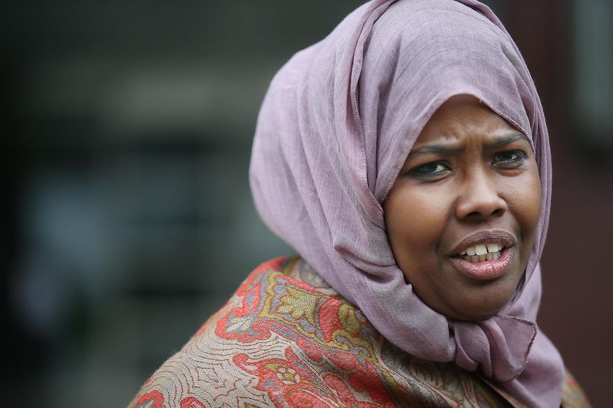 Farah Ayan, the mother of two of the young men standing trial in opening day in the federal trial for three Minnesota men accused of plotting to travel to Syria to join the Islamic State group, speaks to the media in front of the US Courthouse, Monday, May 9, 2016 in Minneapolis, Minn. (Elizabeth Flores/Star Tribune via AP) MANDATORY CREDIT; ST. PAUL PIONEER PRESS OUT; MAGS OUT; TWIN CITIES LOCAL TELEVISION OUT