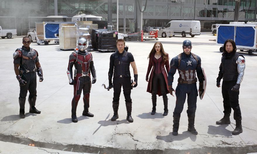 In this image released by Disney, Anthony Mackie, from left, Paul Rudd, Jeremy Renner, Elizabeth Olsen, Chris Evans and Sebastian Stan appear in a scene from "Captain America: Civil War." Going from worst to first in eight years, Disney is set to reap nearly $3 billion in profits from its movie studio this fiscal year. Analysts say that should help the entertainment giant allay worries about customers who cut the pay TV cord. (Disney-Marvel via AP)