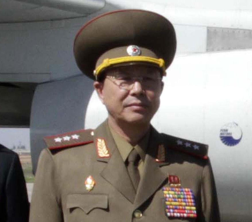 In this May 22, 2013, file photo, Ri Yong Gil, then North Korean military chief, poses for a photo before leaving Pyongyang Airport, North Korea, for China. Ri who Seoul had said was executed is actually alive and in possession of several new senior-level jobs, the North’s state media said Tuesday, May 10, 2016. (AP Photo/Kim Kwang Hyon, File)