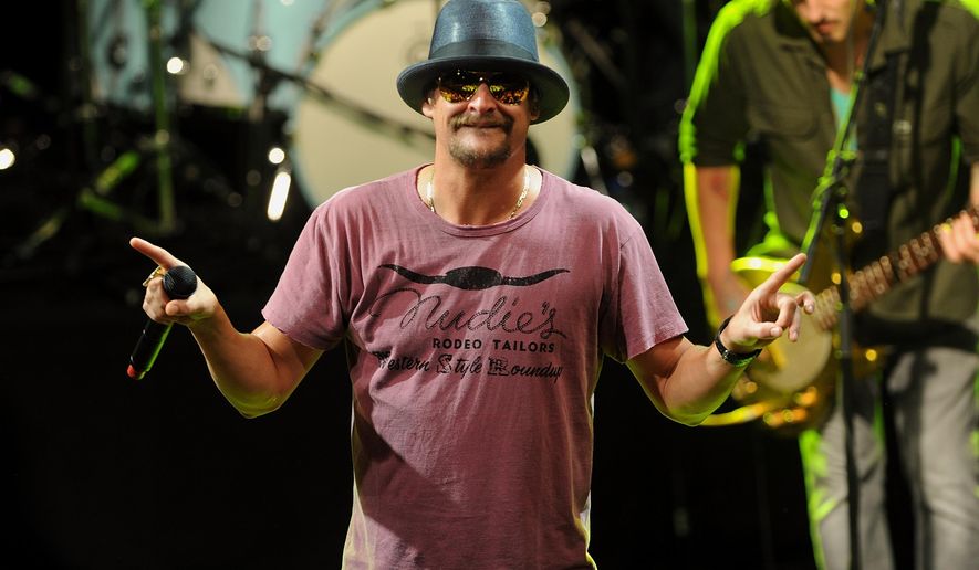 FILE - This May 5, 2015 file photo shows musician Kid Rock performing during National Concert Day in New York. If there’s anyone who can make Donald Trump seem sort of hip, it’s Kid Rock. The candid Detroiter, who supported Mitt Romney in 2012, told Rolling Stone magazine that Trump’s campaign was entertaining but he also trusted his business acumen. (Photo by Brad Barket/Invision/AP, File)