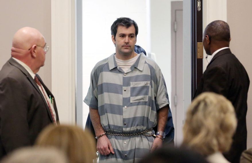FILE - In a Thursday, Sept. 10, 2015 file photo, former North Charleston police office Michael Slager, is lead into court, in Charleston, S.C. A federal judge will decide whether Slager, charged with murder in the shooting death of an unarmed black motorist, can remain free on bond. An indictment unsealed Wednesday, May 11, 2016, shows that Slager is charged with violating Walter Scott's civil rights and two other federal charges. (Grace Beahm/The Post And Courier via AP) MANDATORY CREDIT