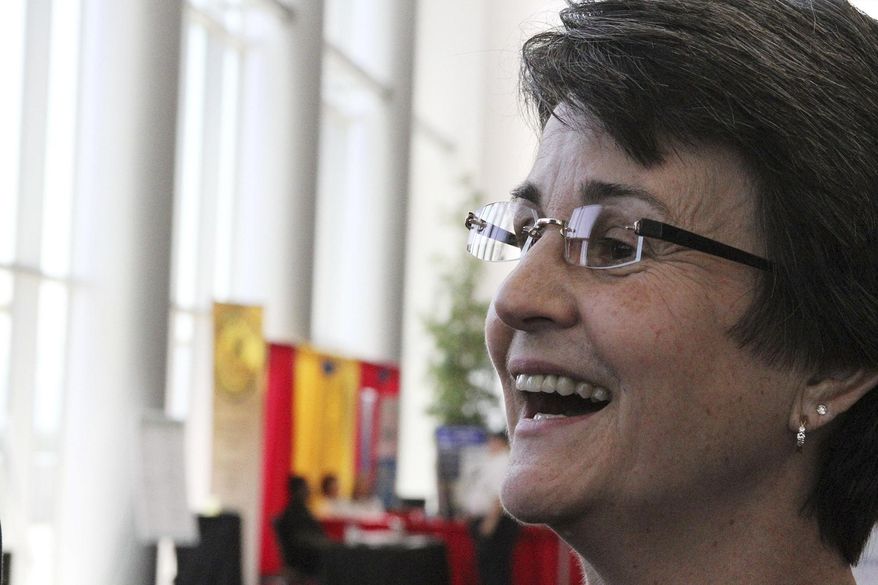 Susan Carney is shown speaking to reporters after she was named the next justice on the Alaska Supreme Court during the Alaska Bar Association convention on Thursday, May 12, 2016, in Anchorage, Alaska. Carney will replace Justice Dana Fabe, who retires June 1. (AP Photo/Mark Thiessen)