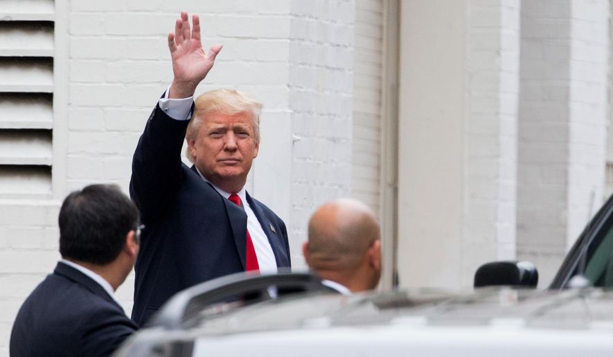 Republican presidential candidate Donald Trump waves as he arrives for a meeting with House Speaker Paul Ryan of Wis., at the Republican National Committee Headquarters on Capitol Hill in Washington, Thursday, May 12, 2016. (AP Photo/Andrew Harnik)