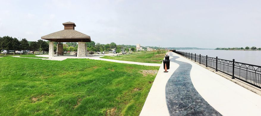 In this Wednesday, May 11, 2016 photo, River Heritage Park is pictured along the Mississippi River in Davenport, Iowa. The U.S. Army Corps of Engineers says it will pay for modifications to the park along the Mississippi River if the city lets it dock a giant towboat there. The Corps is looking for a place to dock its Motor Vessel Mississippi when it passes through the Quad Cities on August 1 of this year. (Kevin E. Schmidt/Quad City Times via AP) MANDATORY CREDIT