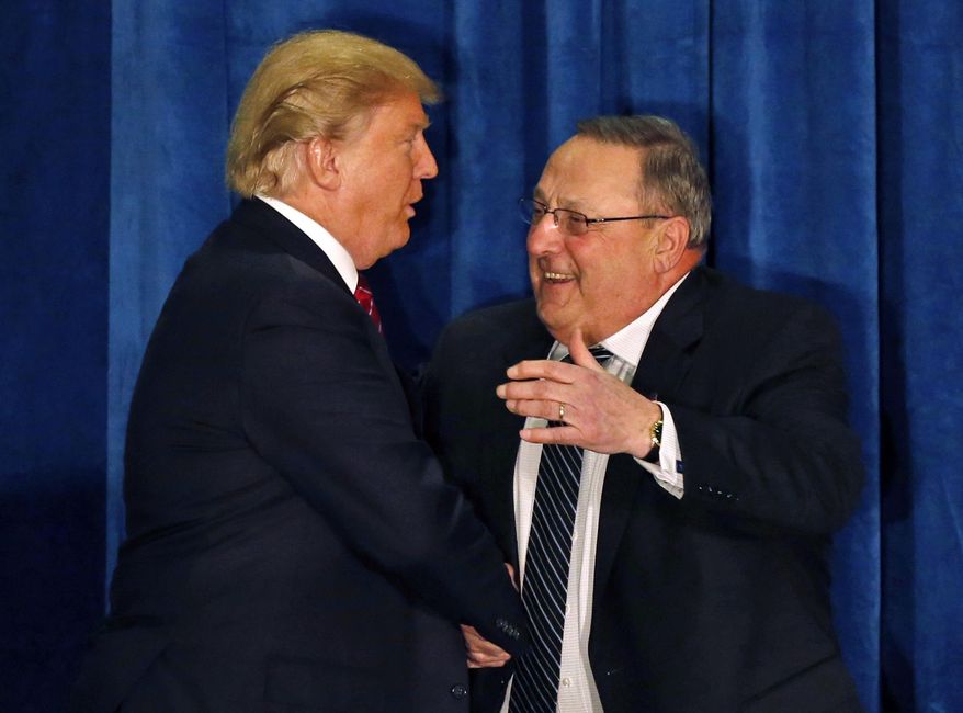 FILE - In this March 3, 2016, file photo, Republican presidential candidate Donald Trump is welcomed to the stage by Maine Gov. Paul LePage, in Portland, Maine. LePage has floated the idea he could play a role in a Trump presidency, a move that might benefit the state's Senate president, a fellow Republican with whom he has had a tepid relationship .(AP Photo/Robert F. Bukaty, File)