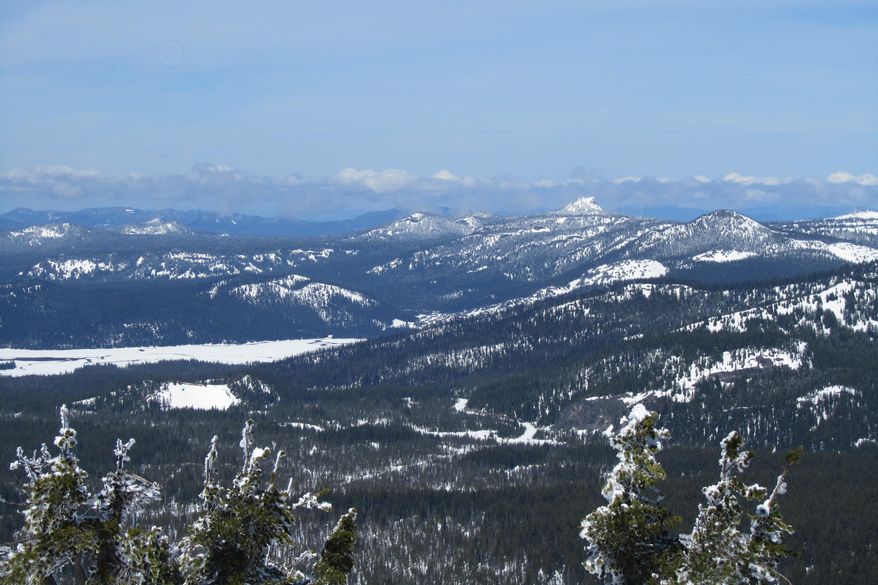 In this April 26, 2016, photo the Sparks Lake and surrounding hills are pictured from the top of Tumalo Mountain, west of Bend, Ore. (Mark Morical/The Bulletin via AP) MANDATORY CREDIT