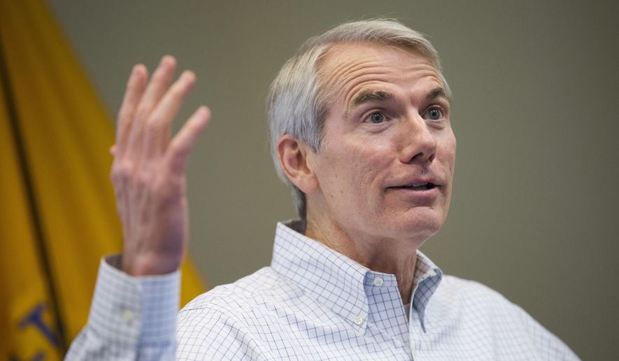FILE - In this April 1, 2016, file photo, U.S. Sen. Rob Portman, R-Ohio, discusses efforts to increase health and safety for workers at the National Institute for Occupation Safety and Health (NIOSH) facility, in Cincinnati. Portman is flexing his cash advantage over Democratic challenger Ted Strickland by snapping up prime TV air time now for ads he'll run across Ohio through Election Day. Portman's considered one of the Senate's most vulnerable Republicans this cycle, as he faces the well-known former governor. (AP Photo/John Minchillo, File)