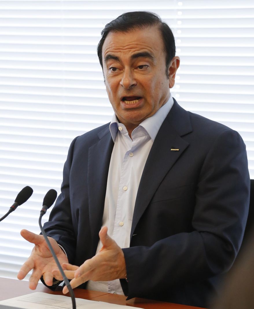 Nissan Chief Executive Carlos Ghosn speaks to the media in the automaker's headquarters in Yokohama, Friday, May 13, 2016. Ghosn is confident the 237 billion yen ($2.2 billion) investment to take a controlling stake in scandal-embroiled Mitsubishi Motors will prove a bargain when sheer size is increasingly critical in the auto industry. (AP Photo/Yuri Kageyama)