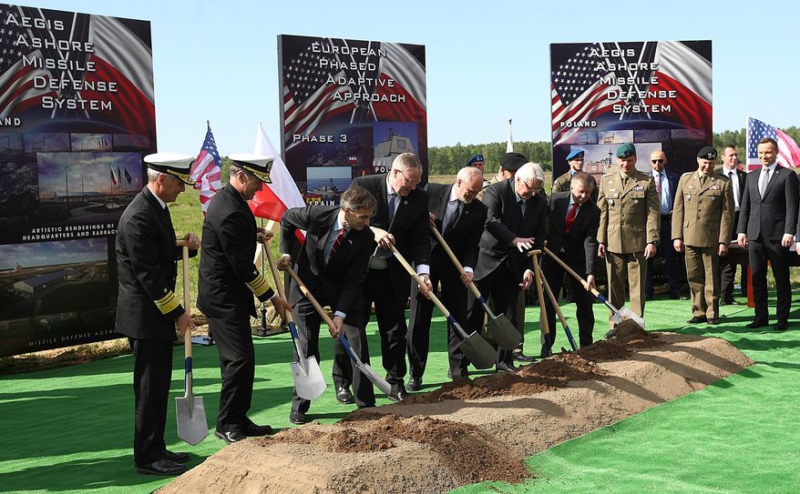 U.S. and Polish officials symbolically break the ground for a construction of the U.S.-led missile defense site that is to be operational in 2018 and defend Europe and the U.S. from missile attacks from outside the Euro-Atlantic area, in Redzikowo, northern Poland, Friday May 13, 2016. (AP Photo/Michal Fludra)
