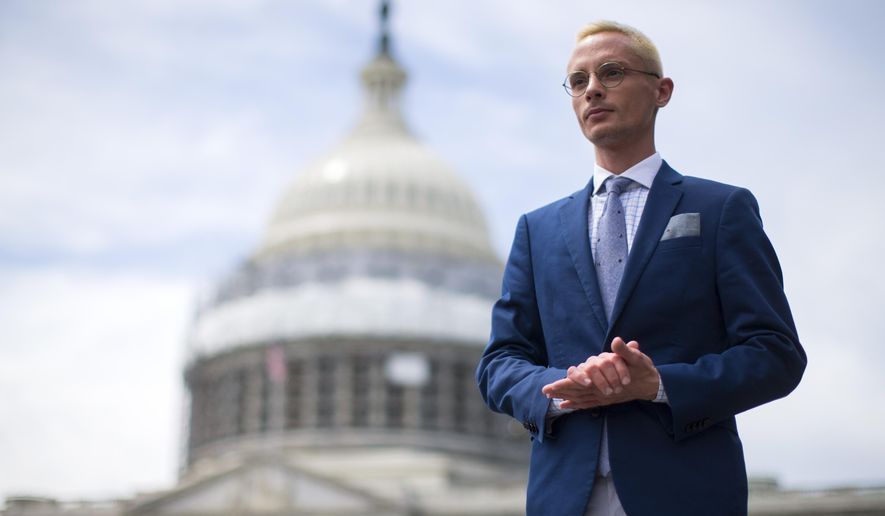 Kristopher Sharp stands for a portrait on Capitol Hill, on Tuesday, April 26, 2016, in Washington. Sharp spent eight years in the Texas foster care system and advocates for reform. "We're constantly being told no, we're making stuff up or it's not that bad or whatever. And here it is, this federal judge is saying it's just as bad as people are saying it is — and in fact, it's even worse." (AP Photo/Evan Vucci)