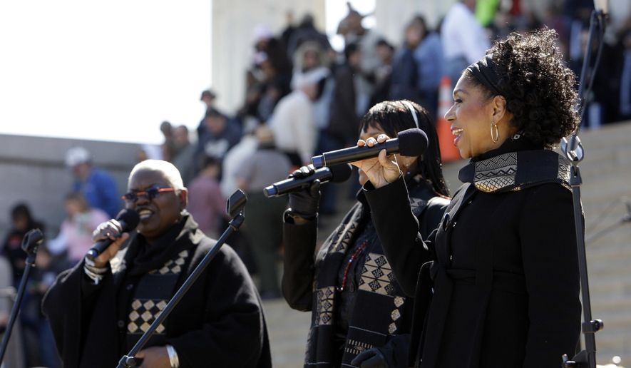 FILE - In this April 12, 2009 file photo, Sweet Honey in the Rock performs during an event to commemorate Marian Anderson's performance 70 years ago, at the Lincoln Memorial in Washington. The a cappella group is planning to protest North Carolina's law addressing LGBT rights and bathroom use by transgender people during their concerts in the state next week. The group announced this week that they will perform as scheduled but protest in song at the Paramount Theatre in Goldsboro, N.C., on May 13, 2016 and at the High Point Theatre in High Point, N.C., on May 14. (AP Photo/Alex Brandon)