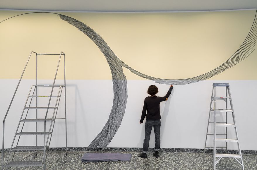 Linn Meyers at work on "Our View from Here" (2016) at the Hirshhorn Museum and Sculpture Garden, Smithsonian Institution, Washington, D.C. (Cathy Carver)