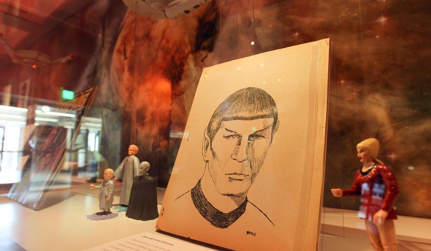 ADVANCE FOR USE SUNDAY, MAY 15 - In this photo taken Wednesday, May 4, 2016, Star Trek memorabilia is displayed at a special exhibit at the University of Iowa's Main Library in Iowa City, Iowa. (David Scrivner/Iowa City Press-Citizen via AP) NO SALES; MANDATORY CREDIT