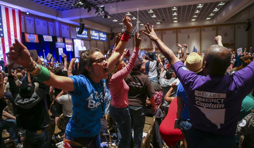 Supporters of Democratic presidential candidate Bernie Sanders react during the Nevada State Democratic Party&#39;s 2016 State Convention at the Paris hotel-casino in Las Vegas on May 14, 2016. The Nevada Democratic Convention turned into an unruly and unpredictable event, after tension with organizers led to some Bernie Sanders supporters throwing chairs and security clearing the room, organizers said. (Chase Stevens/Las Vegas Review-Journal via AP)