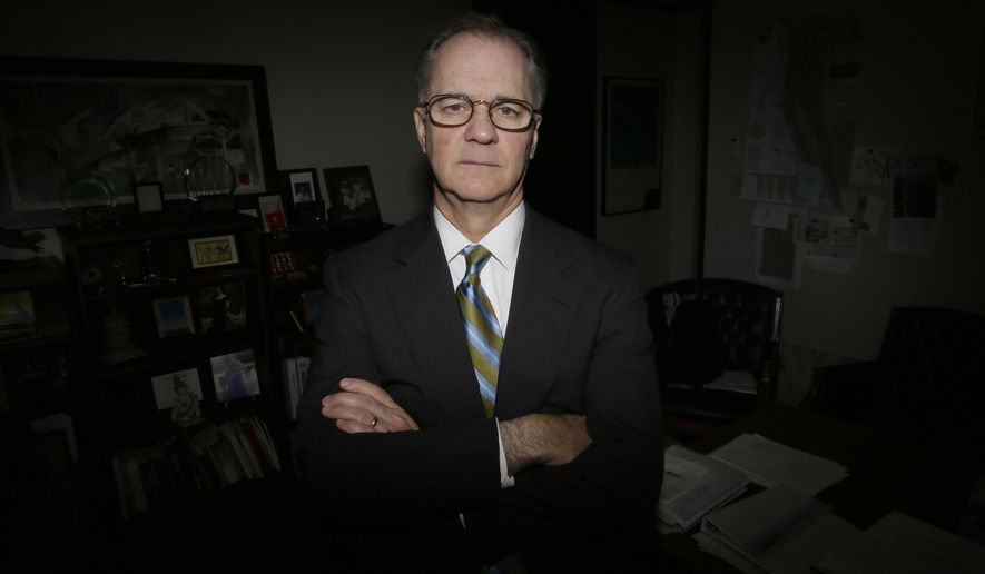 In this Friday, May 6, 2016, photo, Tang Energy CEO Patrick Jenevein poses for a photo in his office in Dallas. Several months earlier, Tang Energy won an arbitration case arising from a contract with Aviation Industry Corp., a conglomerate owned by the Chinese government. AVIC has challenged the ruling in federal court, arguing that as an arm of the Chinese government, it isn't subject to American arbitrators. (AP Photo/LM Otero)
