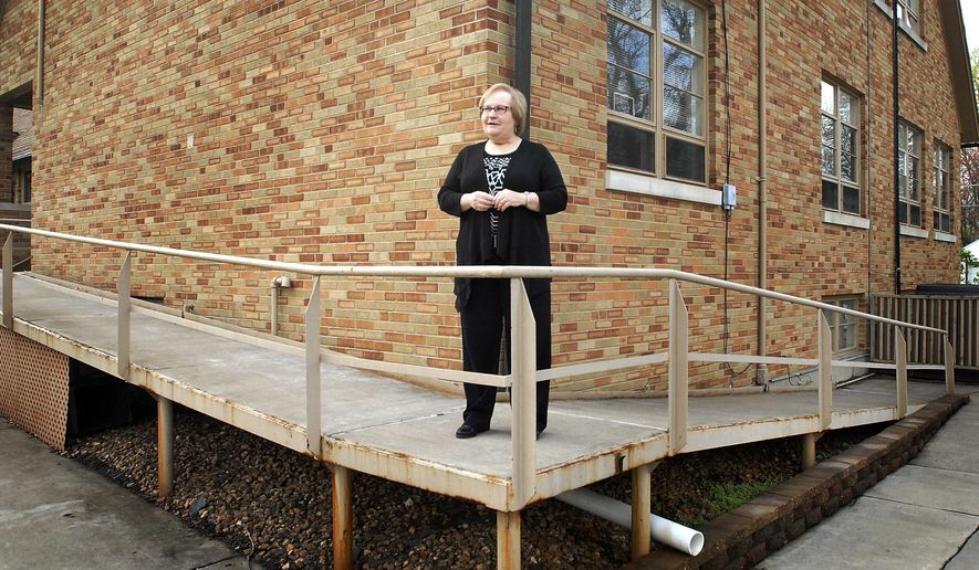 In this April 21, 2016 photo, Rev. Barbara Lohrbach talks about the area of St John's United Church of Christ in Kankakee, Ill., will be expanding later this spring. The church, which has for years welcomed members of the gay and transgender community, has maintained a healthy congregation particularly because of affirming policy. Lohrbach, the church's pastor since 2004, estimates 40 percent of St. John's congregation would be classified as LGBT. (Mike Voss/The Daily Journal via AP) MANDATORY CREDIT