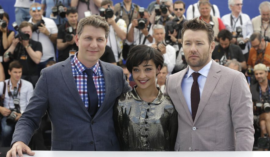 Actors Joel Edgerton, from right, Ruth Negga and director Jeff Nichols pose for photographers during a photo call for the film Loving at the 69th international film festival, Cannes, southern France, Monday, May 16, 2016. (AP Photo/Lionel Cironneau)