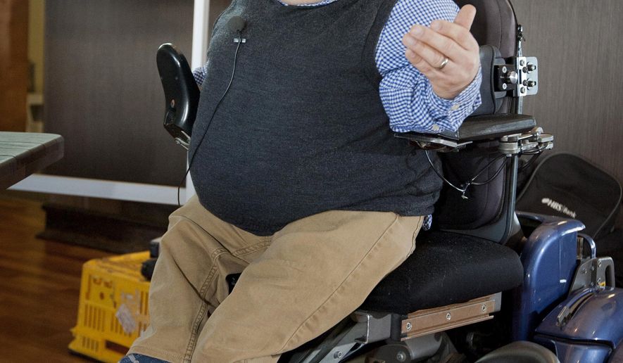In this Aug. 26, 2014 photo, Samual Gibson speaks at a fundraising event for the Cranford Hospice in Hastings, New Zealand. Gibson, who inspired many by defying the brittle bones he was born with and pursuing a life filled with rigorous outdoor adventures, died Monday, May 16, 2016, after falling from his wheelchair while competing in a half-marathon. He was 39.(Glenn Taylor/Hawkes Bay Today via AP) NEW ZEALAND OUT, AUSTRALIA OUT