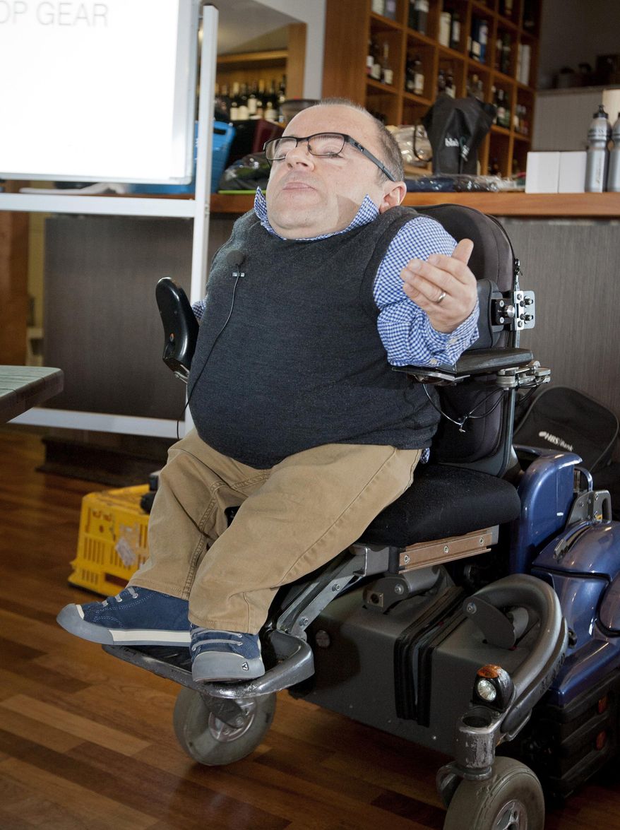 In this Aug. 26, 2014 photo, Samual Gibson speaks at a fundraising event for the Cranford Hospice in Hastings, New Zealand. Gibson, who inspired many by defying the brittle bones he was born with and pursuing a life filled with rigorous outdoor adventures, died Monday, May 16, 2016, after falling from his wheelchair while competing in a half-marathon. He was 39.(Glenn Taylor/Hawkes Bay Today via AP) NEW ZEALAND OUT, AUSTRALIA OUT