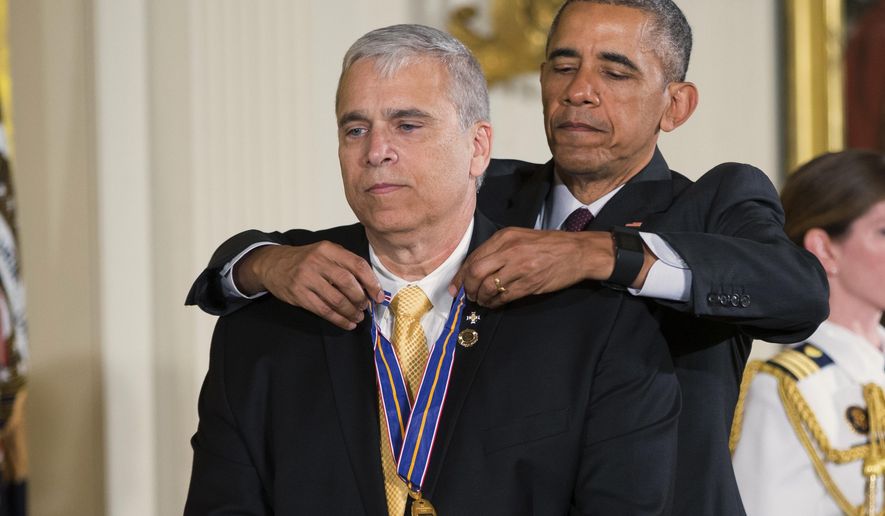 President Barack Obama presents the Medal of Valor to Officer Mario Gutierrez, of the Miami-Dade Police Department, Fla., during a ceremony in the East Room of the White House in Washington, Monday, May 16, 2016. The Medal of Valor is awarded to public safety officers who have exhibited exceptional courage, regardless of personal safety, in the attempt to save or protect others from harm. (AP Photo/Evan Vucci)
