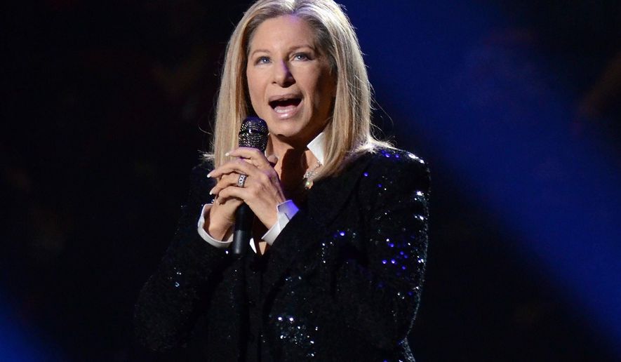 FILE - In this Oct. 11, 2012, file photo, singer Barbra Streisand performs at the Barclays Center in the Brooklyn borough of New York. Streisand is launching a multiple-city tour this summer. Streisand's manager said Monday, May 16, 2016, the entertainer will appear at arenas across the country. (Photo by Evan Agostini/Invision/AP, File)