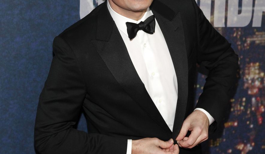 FILE - In this Feb. 15, 2015 file photo, Jimmy Fallon attends the SNL 40th Anniversary Special in New York. Fallon donned a period costume Monday, May 16, 2016, for a "Hamilton" takeoff at NBC's annual presentation of next season's schedule. The "Tonight" show host walked down the aisle at Radio City Music Hall for a comic spoof on the business of television. (Photo by Andy Kropa/Invision/AP, File)
