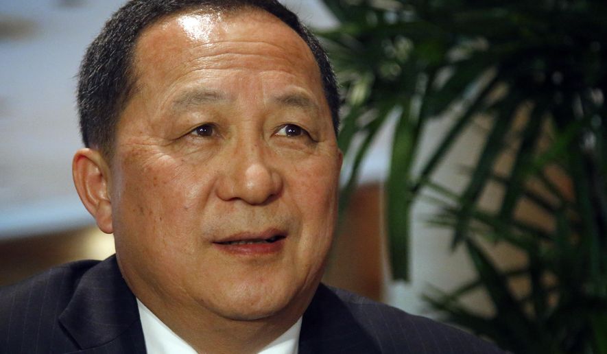 In this Monday, Jan. 19, 2015, photo, North Korea's senior nuclear negotiator Ri Yong Ho, prepares to deliver a statement to the media in Singapore. North Korea has named Ri Yong Ho, a career diplomat with broad experience in negotiating with rivals South Korea and the United States as its new foreign minister. (AP Photo/Wong Maye-E)