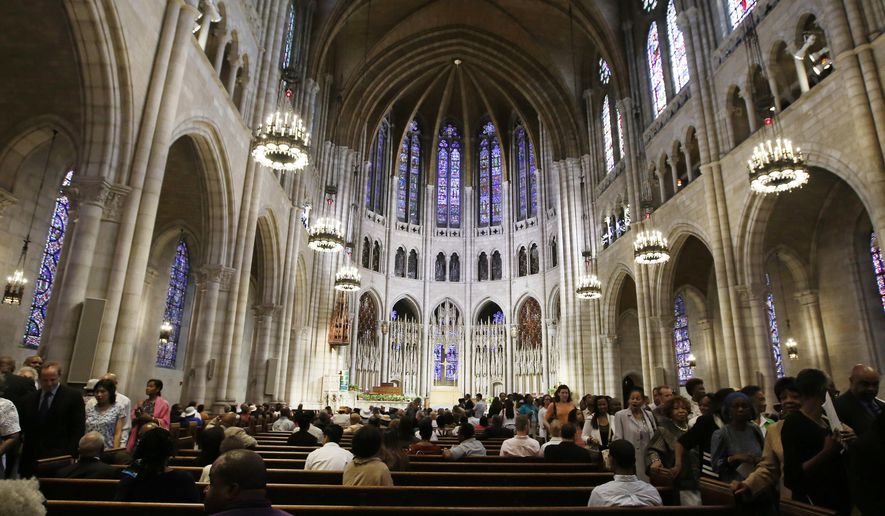 FILE- This July 20, 2014, file photo shows the vaulted ceiling inside New York's Riverside Church. It is one of the religious institutions across New York state showcasing their art, architecture and history during the New York Landmark Conservancy's annual "Sacred Sites Open House Weekend" from May 21-22, 2016. (AP Photo/Kathy Willens, File)
