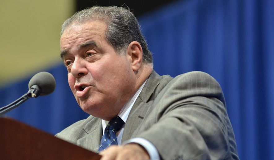In this Oct. 2, 2013, file photo, Supreme Court Justice Antonin Scalia speaks at Tufts University in Medford, Mass. (AP Photo/Josh Reynolds, File)