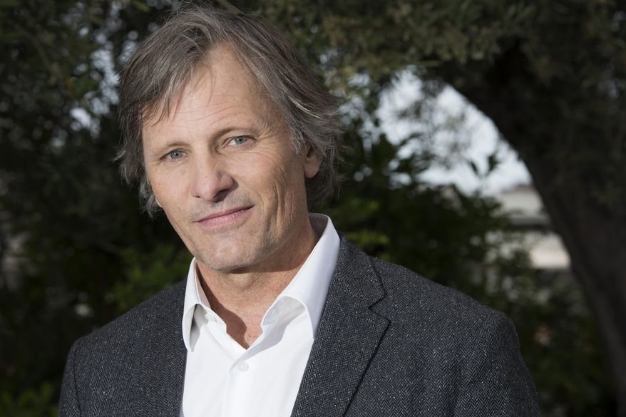 Actor Viggo Mortensen poses for portrait photographs for the film Captain Fantastic at the 69th international film festival, Cannes, southern France, Wednesday, May 18, 2016. (AP Photo/Joel Ryan)