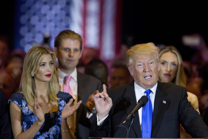 In this photo taken May 3, 2016, Ivanka Trump, daughter of Republican presidential candidate Donald Trump, listens at left as Trump speaks in New York. Ivanka Trump is defending her father Donald against charges that he mistreats women, insisting that the presumptive Republican presidential nominee is “not a groper.” (AP Photo/Mary Altaffer)