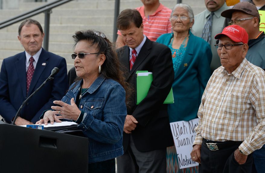 Marie Holiday of the Oljato & Navajo Mountain Community joins Utah lawmakers on the steps of the Capitol during a news conference about a proposed national monument in the Bears Ears area of southeastern Utah at the state Capitol on Tuesday, May 17, 2016, in Salt Lake City. Utah Gov. Gary Herbert said that the proposed national monument would close off the area and block tribal members from using the land. The news conference came a day before lawmakers were set to gather in a special session to pass a resolution trumpeting their opposition to the proposed monument. (Francisco Kjolseth /The Salt Lake Tribune via AP) DESERET NEWS OUT; LOCAL TELEVISION OUT; MAGS OUT; MANDATORY CREDIT
