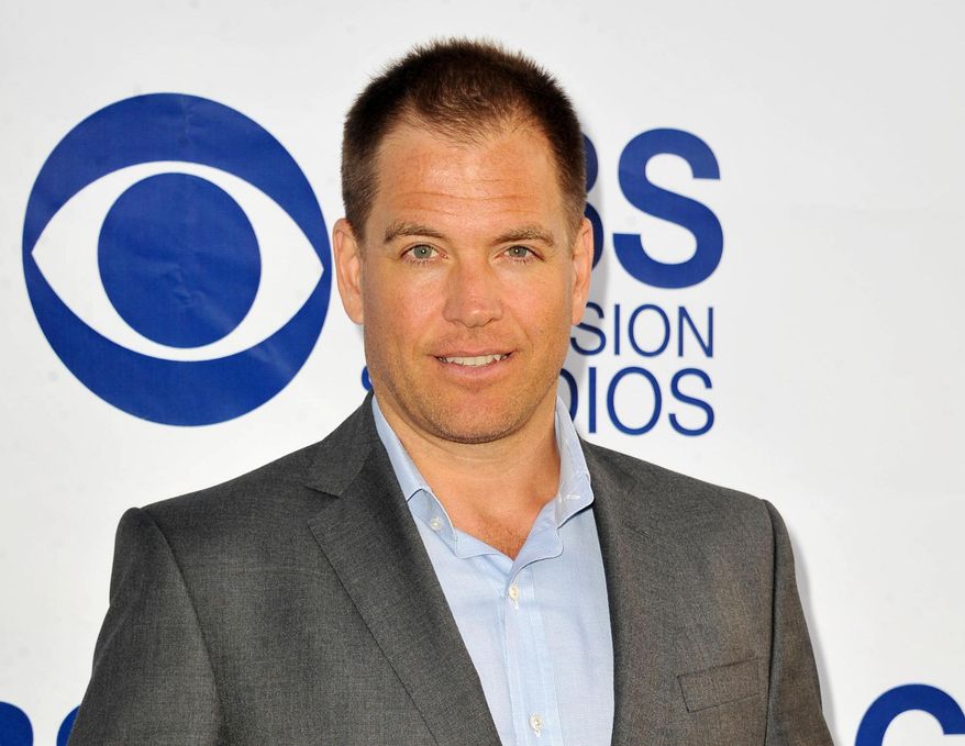 FILE - In this May 19, 2014 file photo, Michael Weatherly arrives at CBS Television Studios Summer Soiree at The London Hotel, in Los Angeles. Weatherly staying on CBS' Tuesday night lineup as the star of a new drama based on talk show host Dr. Phil McGraw's past career as a trial consultant. (Photo by Katy Winn//Invision/AP, File)