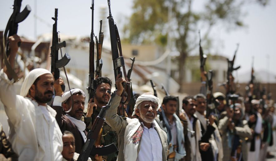 Shiite Houthi tribesmen hold their weapons as they chant slogans during a tribal gathering showing support for the Houthi movement, in Sanaa, Yemen, Thursday, May 19, 2016. On Tuesday the Yemeni Foreign Minister Abdul-Malik al-Mekhlafi announced the suspension of peace talks held in Kuwait with Shiite rebels after weeks of no progress, saying the rebels refuse to accept the legitimacy of the country&#39;s internationally-recognized president. (AP Photo/Hani Mohammed)