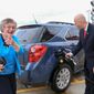 Nebraska Gov. Pete Ricketts pumps E-85 ethanol blend fuel into a car whose driver reacts to the presence of photographers, while visiting the Sapp Brothers Travel Center in Omaha, Neb., Thursday, May 19, 2016, to promote renewable fuels month in Nebraska. (AP Photo/Nati Harnik) ** FILE **