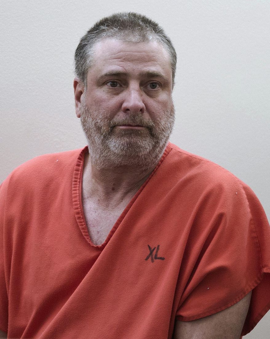 FILE - This May 17, 2016 file photo shows Mark Anthony Desimone, 53, in Juneau District Court for his arraignment on murder charges in Juneau, Alaska. Shortly before his arrest for murder in Alaska, the former Arizona state lawmaker raised concerns among Facebook friends with a string of messages noting he was looking for work, even odd jobs, followed by cryptic apologies to "everyone for anything" he may have done in office. Just weeks later, he was charged with first-degree murder in the death of a man in a hunting party near Juneau, Alaska's capital city, after a day of drinking. (Michael Penn/Juneau Empire via AP, File) MANDATORY CREDIT