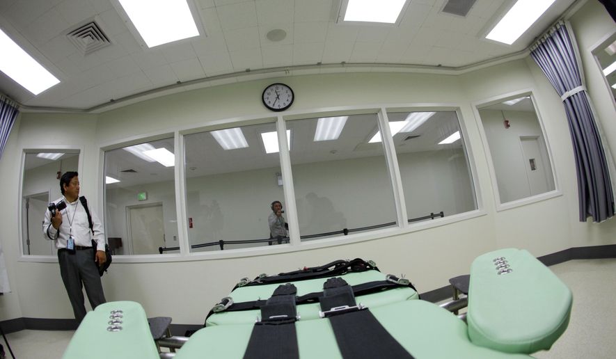 FILE - In this Sept. 21, 2010 file photo, the view a condemned inmate would have from a table inside the death chamber is shown during a tour of the new lethal injection facility at San Quentin State Prison in San Quentin, Calif. Death penalty supporters are setting the stage for a November showdown over whether to speed up executions in California or do away with them entirely. They'll be holding some 10 news conferences up and down the state on Thursday, May 19, 2016. (AP Photo/Eric Risberg, File)